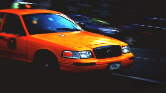 yellow Ford Crown Victoria taxi photo