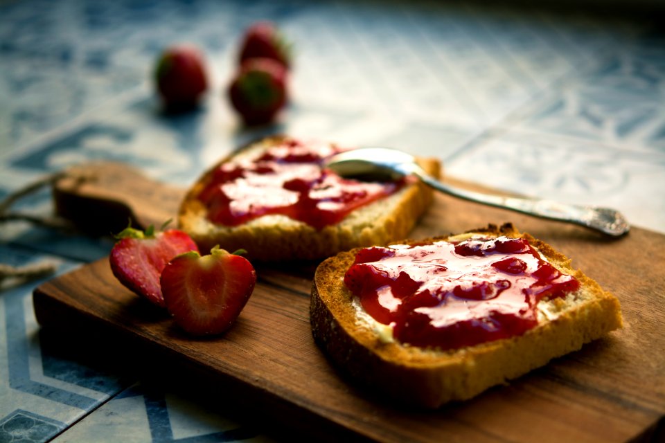 photo of bread with strawberry jam