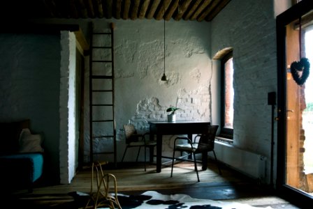 black wooden table and chairs photo