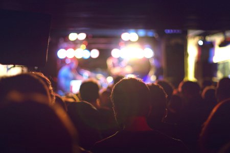 bokeh photography of man wearing shirt