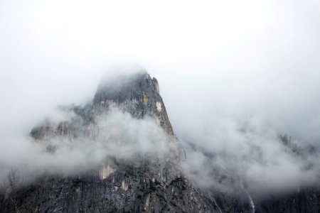 Rocky mountain peak in Yosemite on a  foggy day