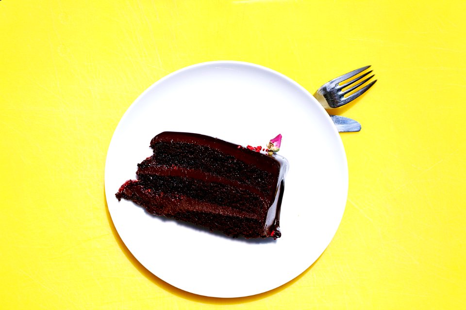 sliced cake on white ceramic saucer