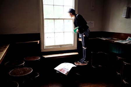 man standing near the window