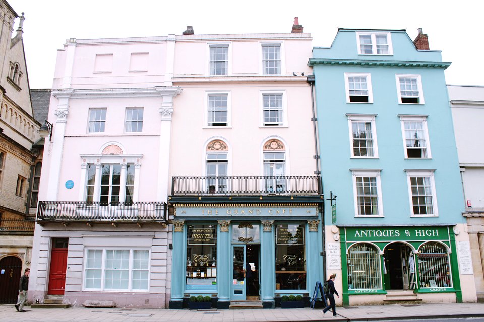 white and blue 4-storey house