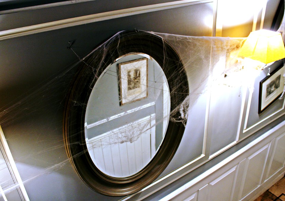 round black-framed mirror