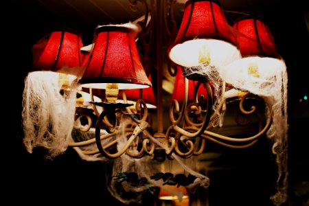 red and brown uplight chandelier photo