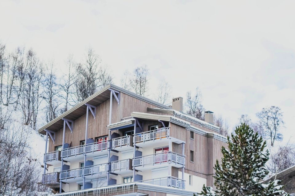 brown and white wooden house during daytime