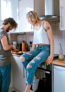 woman and man in kitchen photo