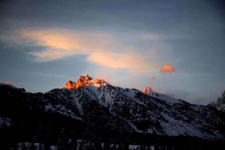 mountain covered by snow during sunset