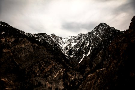 cloudy sky above snow covered mountain photo