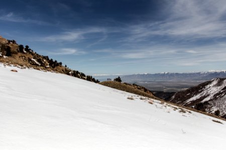 snow covered field under blue sky during daytime photo