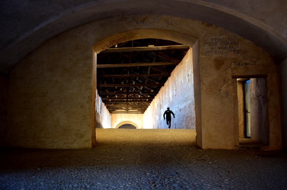 man running in tunnel photo