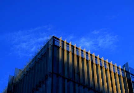 white concrete building under blue sky during daytime photo