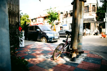 photo of bike parked on post