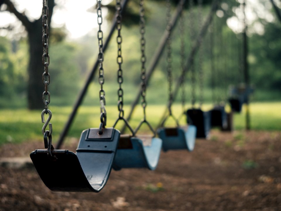 selective focus shot of outdoor swing