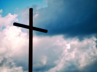 black cross under blue sky