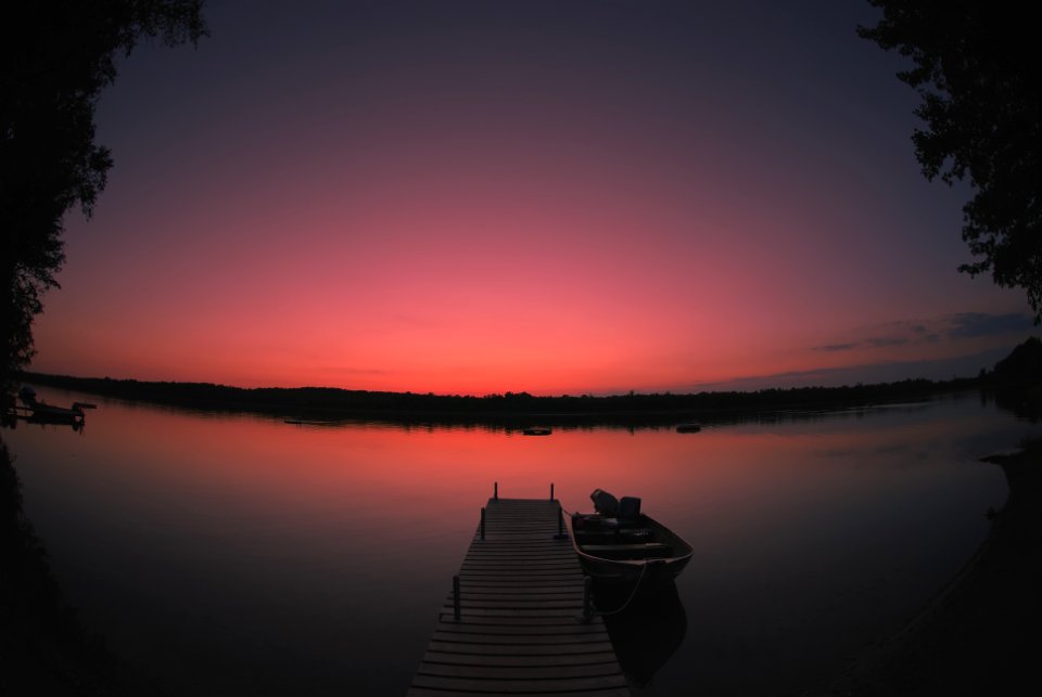 canoe on dock at night