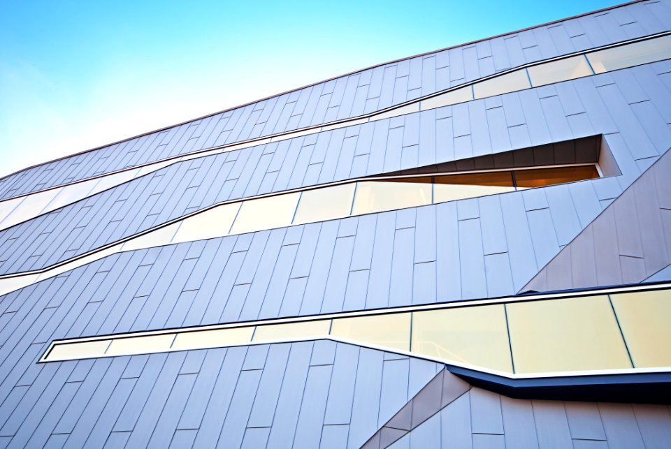 Modern building design with distinctive unique shaped glass windows photo