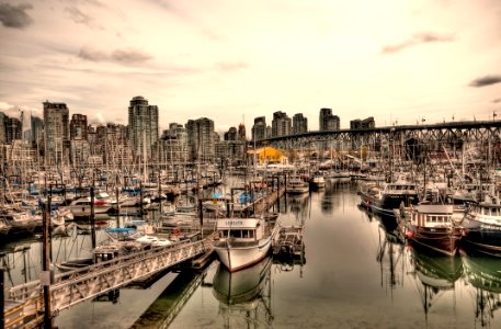 white boat by the dock