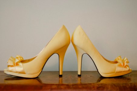 pair of brown patent-leather open-toe platform stiletto pumps photo