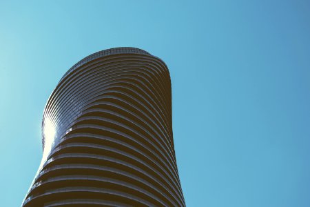 low angle photography of black high-rise building photo