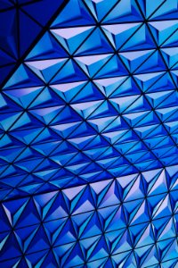 architectural photography of blue glass celing photo