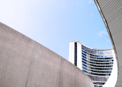 Concrete walls near the curved building of Toronto City Hall photo