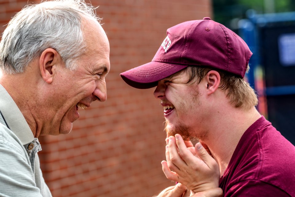 two man laughing at each other