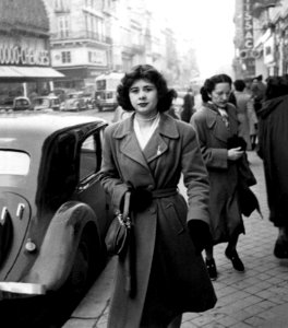 women wearing coat grey-scale photography photo