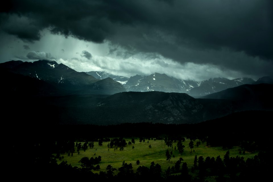 landscape photography of mountains during cloudy skies