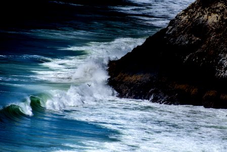 wave of sea on rock photo