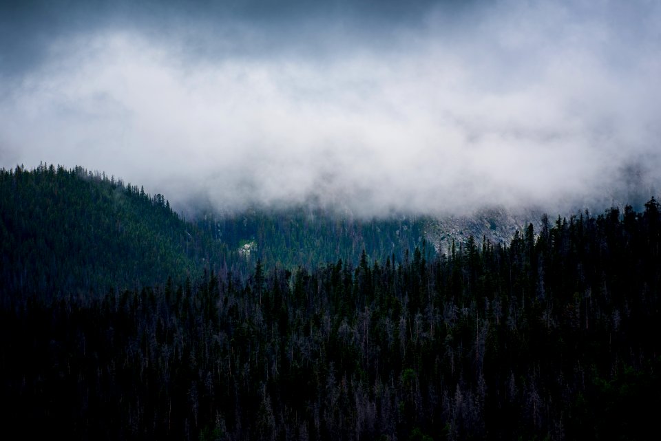 mountain under cloudy sky