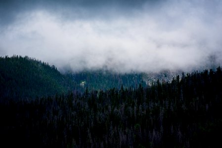 mountain under cloudy sky photo