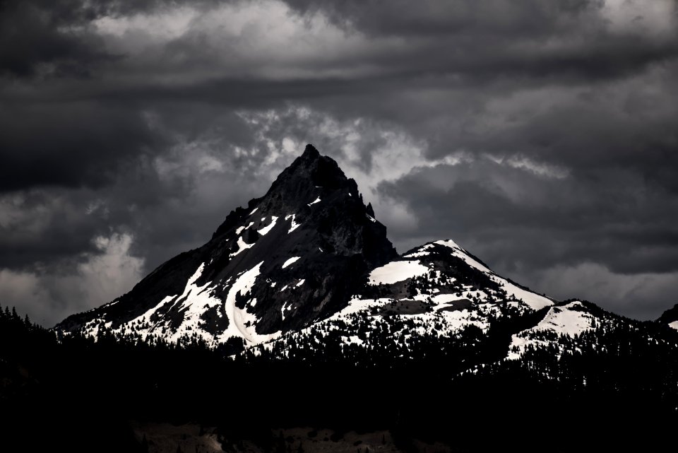 silhouette photo of mountain covered with snow