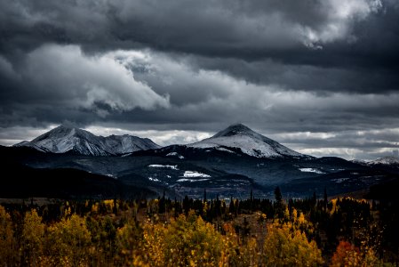 snow capped mountain under cloudy sky