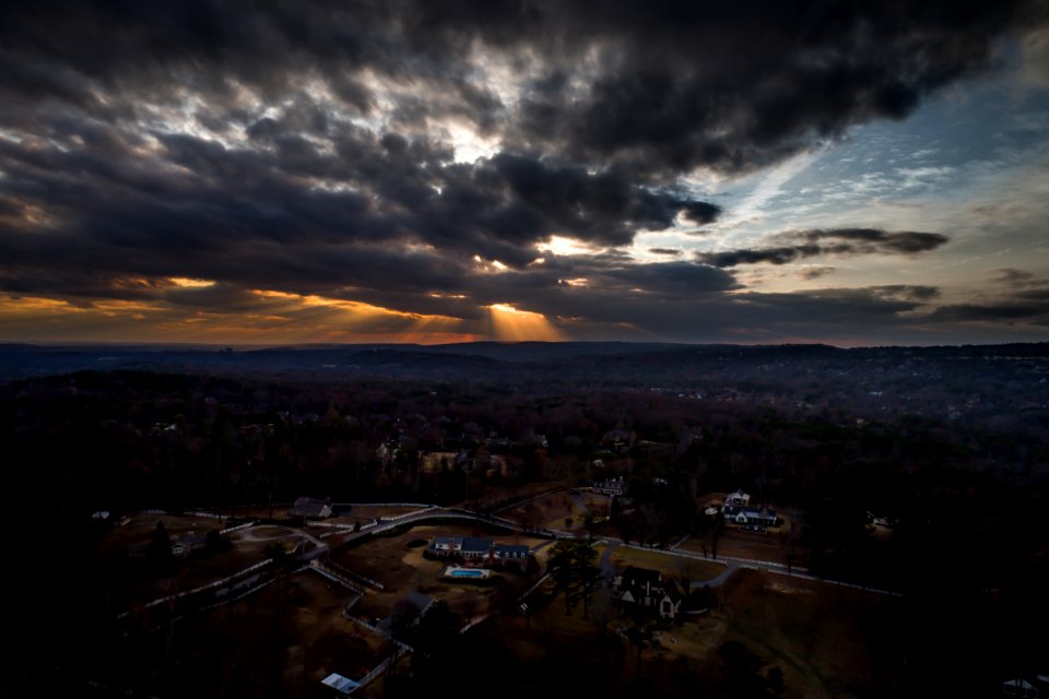 aerial view of rural area under dark clouds