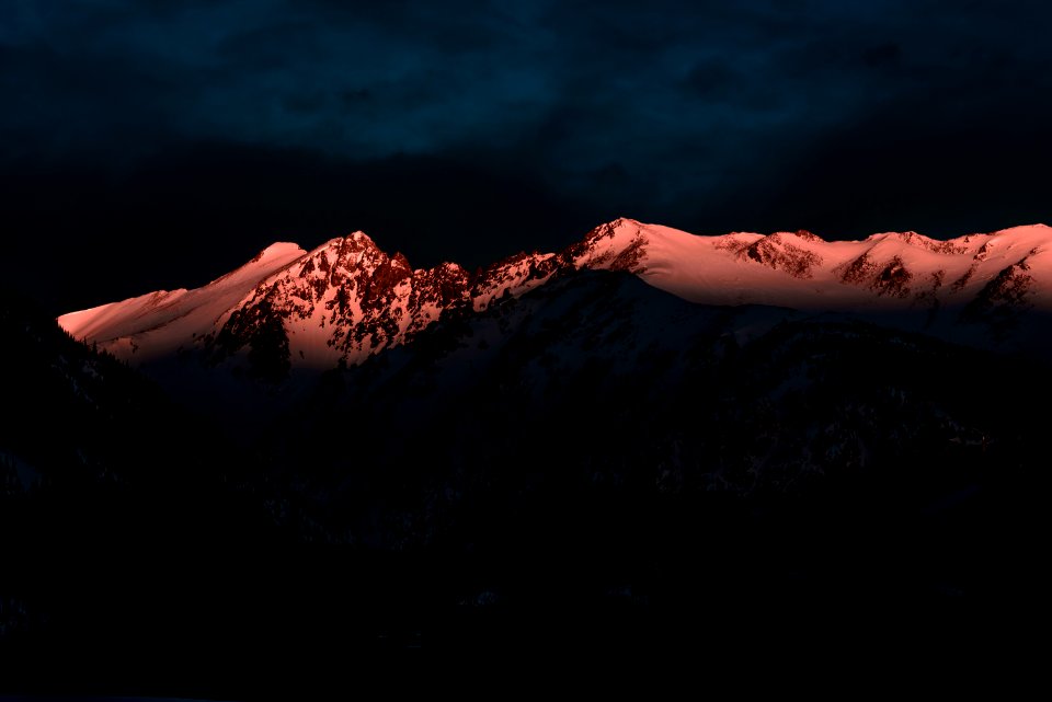 ice-capped mountain at night time