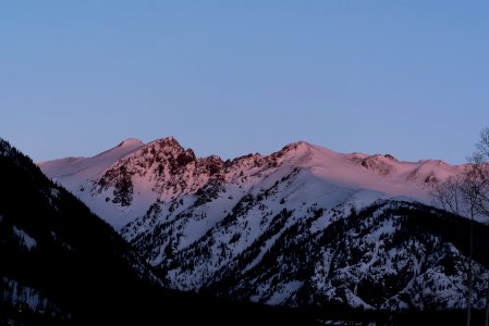 landscape photography of mountain under white sky photo