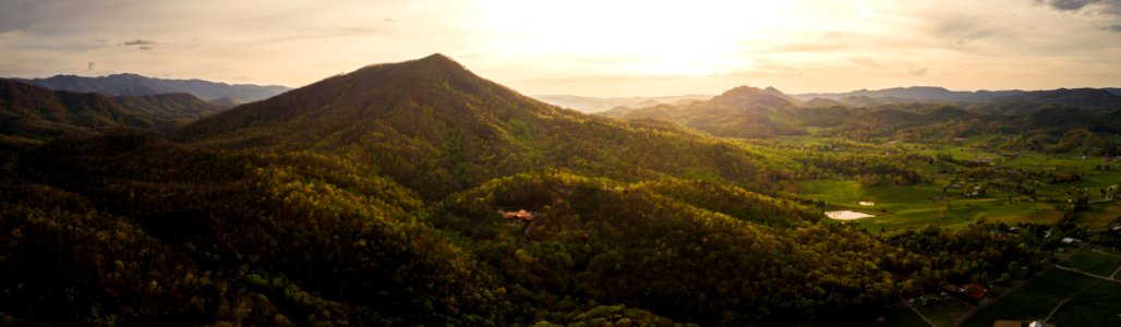 birds eye photography of green mountain