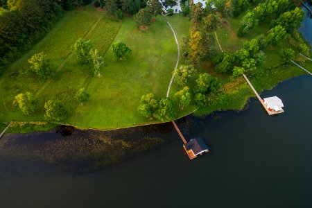 Aerial of house near river photo