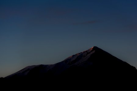 mountain silhouette at golden hour photo
