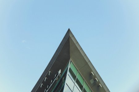 low-angle photography of building under blue sky photo