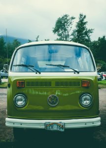 white and green Volkswagen T2 van parked in parking space photo