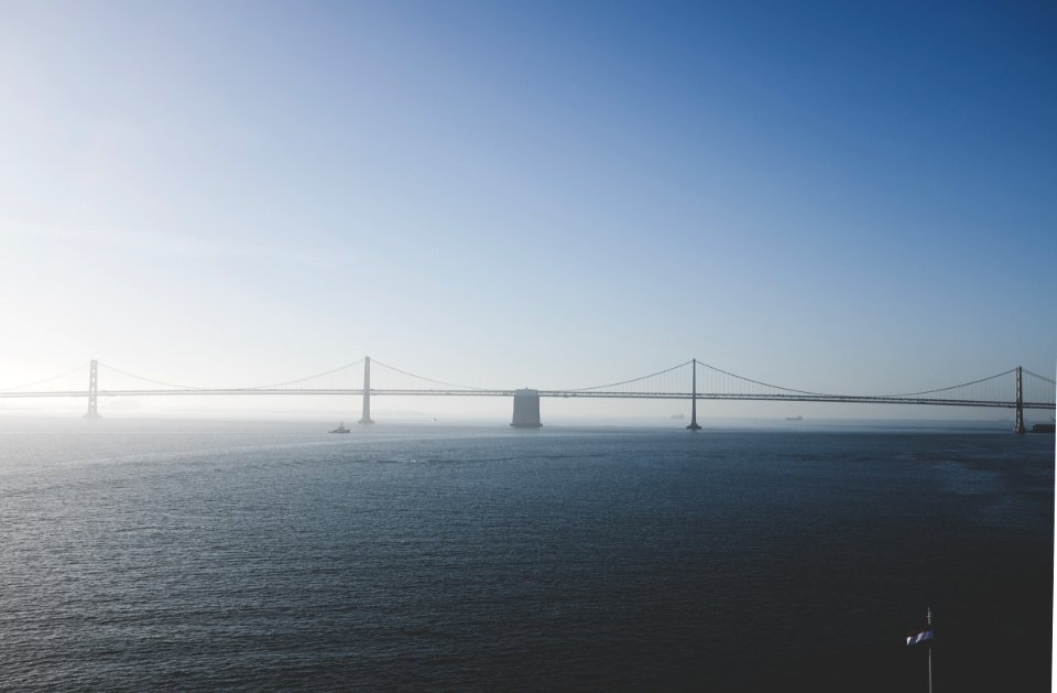 steel bridge under blue sky