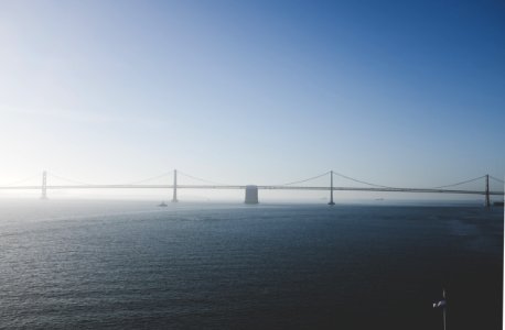 steel bridge under blue sky