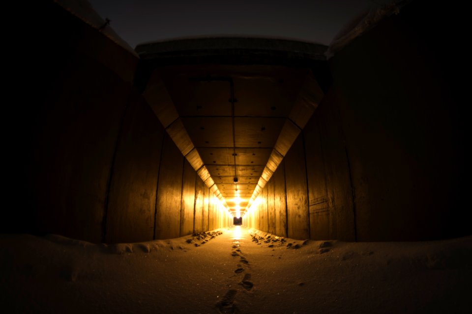 sand on hallway with yellow light photo