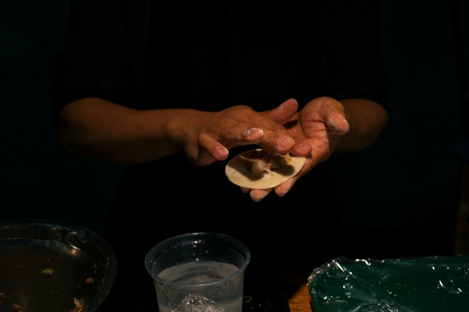 person holding food on palm
