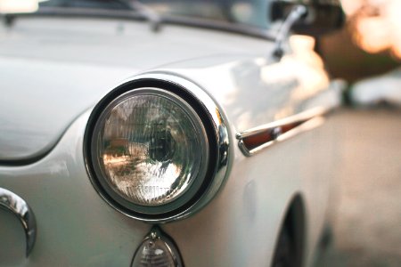 vehicle headlight close-up photography photo