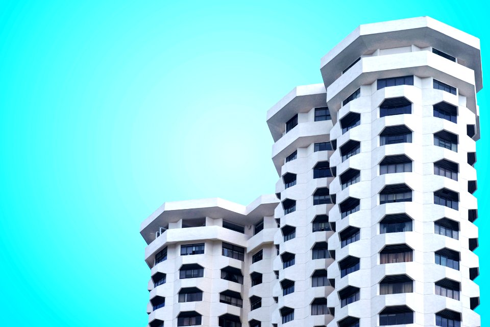 low angle photo of white concrete building photo