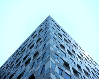 gray concrete building under blue sky photo